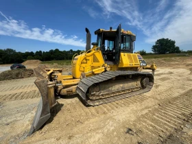   Komatsu