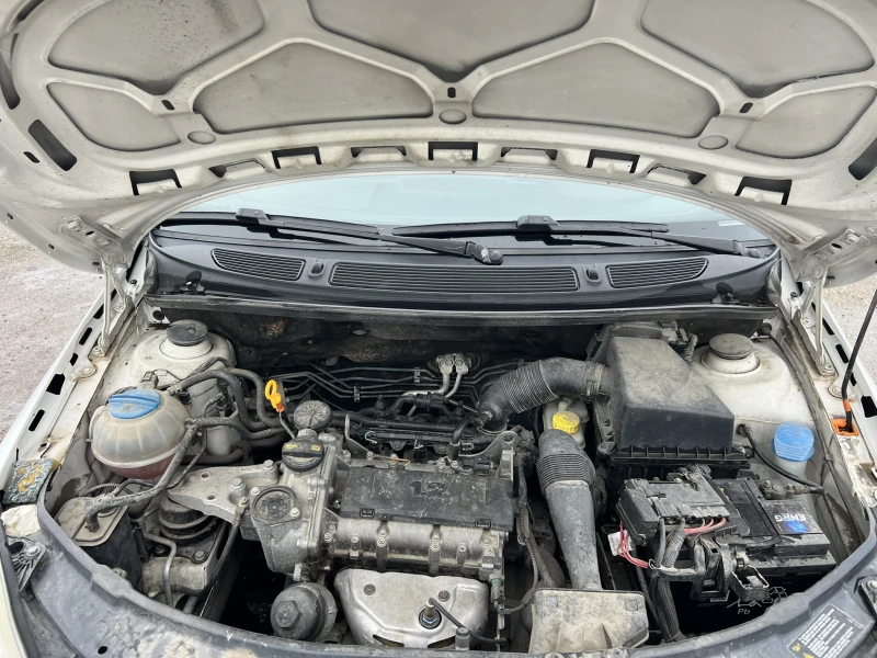 Skoda Roomster 1.2, снимка 11 - Автомобили и джипове - 53340452