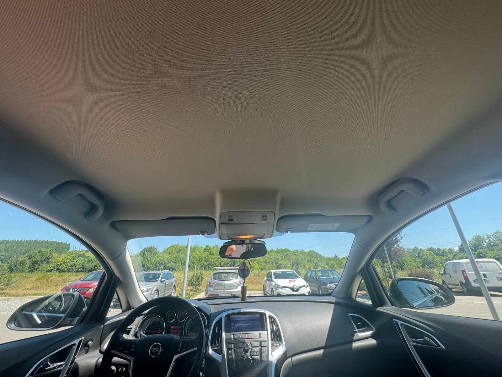 Opel Astra 1.7 CDTI / ЛЕТИ ДЖ 19" / УНИКАЛНО СЪСТ., снимка 11 - Автомобили и джипове - 55091657