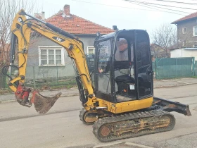 Багер Cat 302.7D, снимка 1