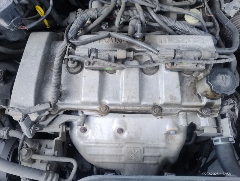 Mazda Premacy 1.9 газ клима, снимка 15 - Автомобили и джипове - 52819614