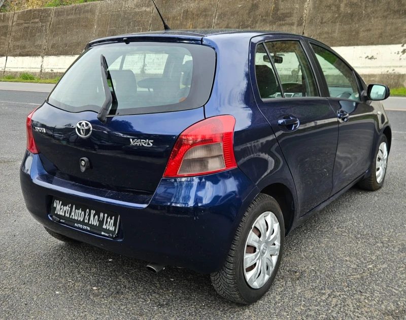 Toyota Yaris 1.0 i, снимка 9 - Автомобили и джипове - 47671680