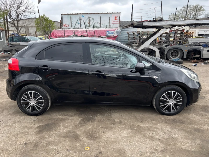 Kia Rio 1.4 D  6 скорости, снимка 15 - Автомобили и джипове - 52446129