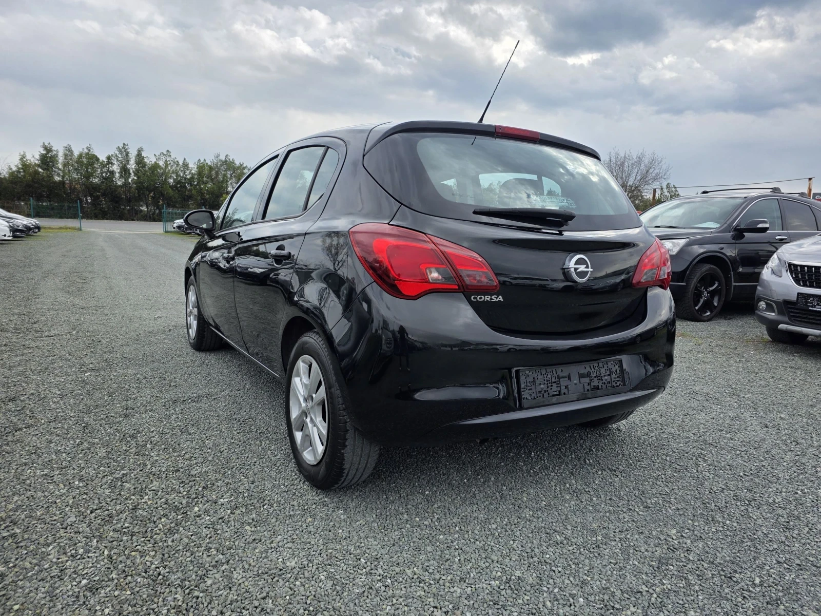 Opel Corsa 1.4 фабрична газ , снимка 7 - Автомобили и джипове - 54091807
