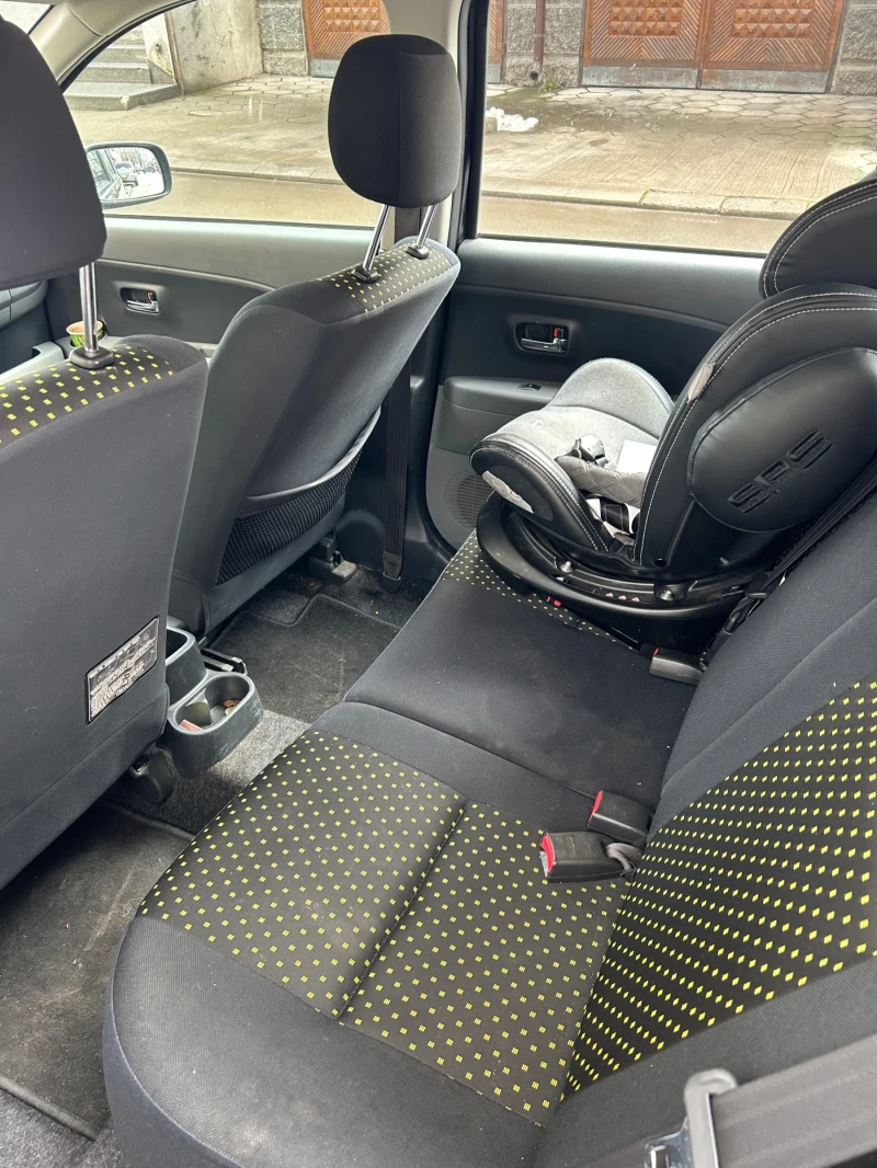 Daihatsu Sirion 1.3 4x4, снимка 6 - Автомобили и джипове - 53392308