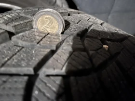 Гуми Зимни 245/40R18, снимка 9 - Гуми и джанти - 52773316