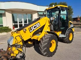 Телескопични товарачи JCB TM 180, снимка 6