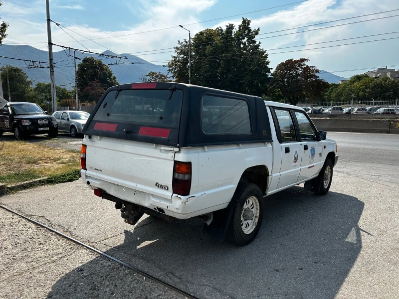 Mitsubishi L200, снимка 4 - Автомобили и джипове - 46923493