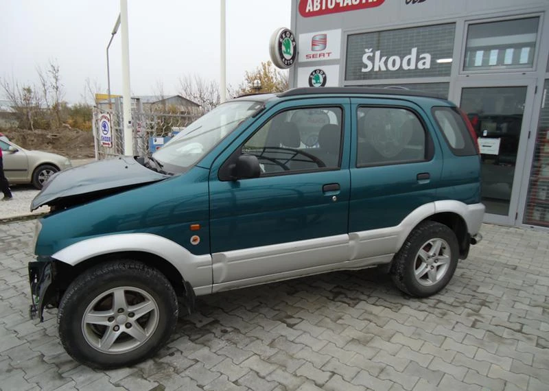 Daihatsu Terios 1.3 16V 4X4, снимка 12 - Автомобили и джипове - 4369894