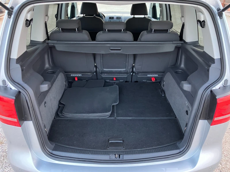 VW Touran 1.4- 7 местен, снимка 14 - Автомобили и джипове - 50659373