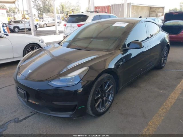 Tesla Model 3 STANDARD RANGE PLUS REAR-WHEEL DRIVE