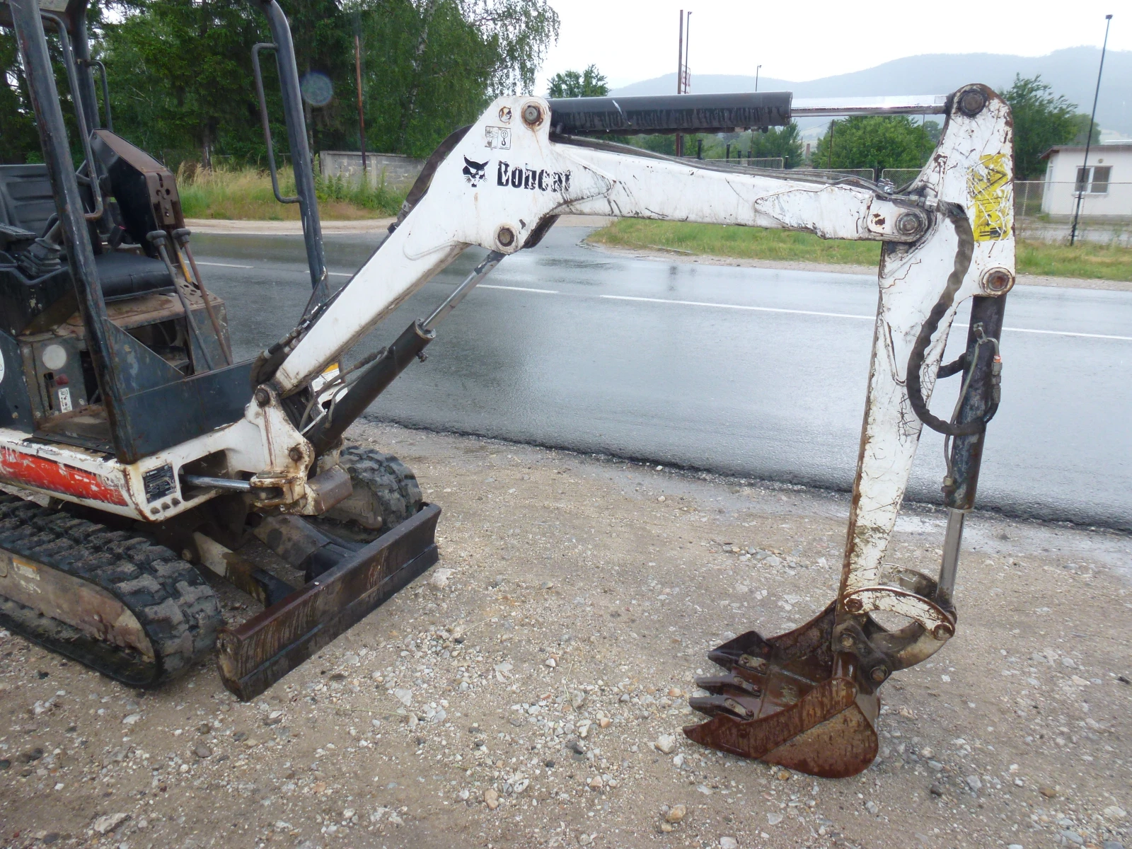Багер Bobcat 322