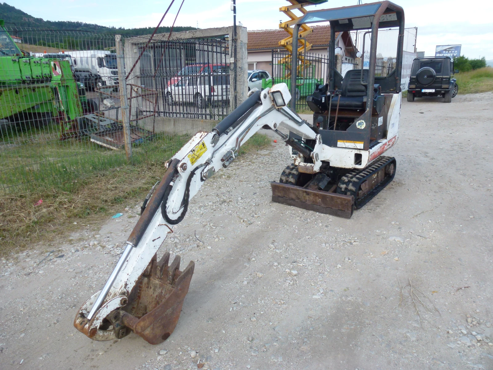 Багер Bobcat 322