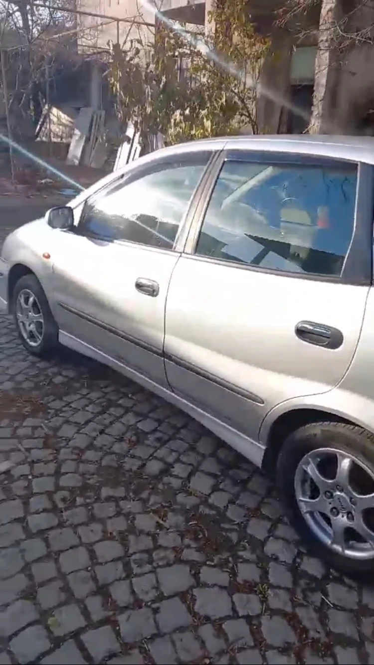 Nissan Almera tino 2.2d 112кс, снимка 2 - Автомобили и джипове - 53139933
