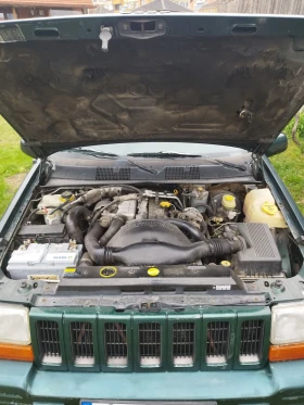 Jeep Grand cherokee 2.5 td, снимка 13