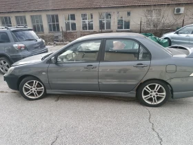 Mitsubishi Lancer - 11 € / 21.51 лв. - 18738364 5