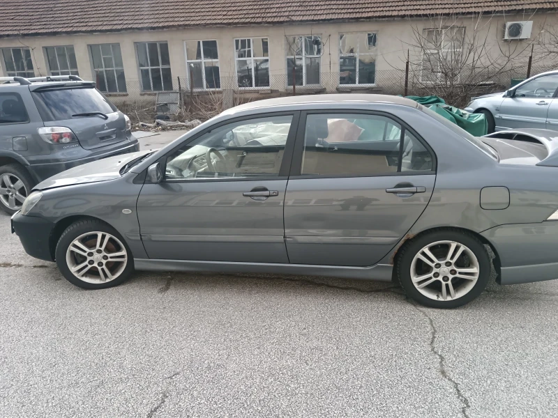 Mitsubishi Lancer, снимка 5 - Автомобили и джипове - 53011219