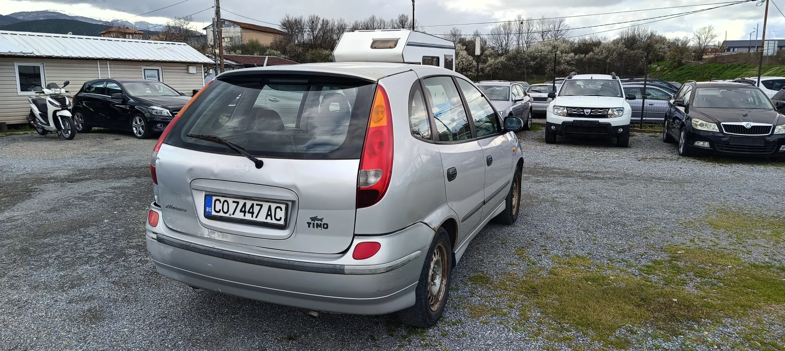 Nissan Almera tino 1.8 .газ, снимка 3 - Автомобили и джипове - 54082707
