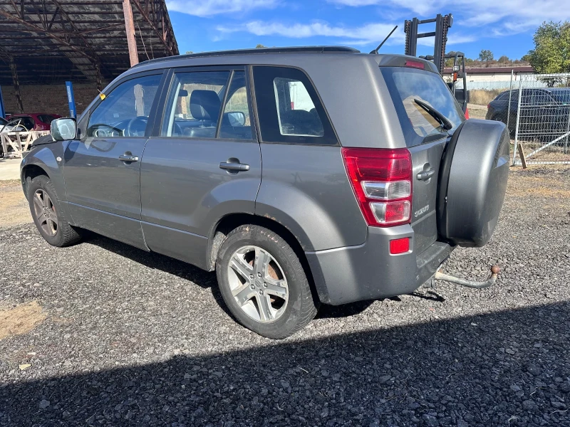 Suzuki Grand vitara 2.0 Автоматик, снимка 5 - Автомобили и джипове - 52180425