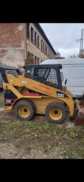 Мини челни товарачи Cat CAT 232, снимка 1