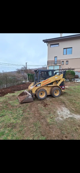 Мини челни товарачи Cat CAT 232, снимка 2