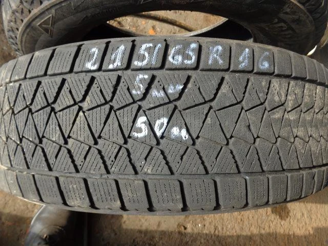 Гуми Зимни 215/65R16, снимка 1 - Гуми и джанти - 20226548