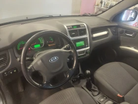 Обява за продажба на Kia Sportage 2.0i/4х4/втори фейслифт/газ-бензин/140к.с. ~13 990 лв. - изображение 7