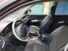 Kia Sportage 2.0 газ 4x4, снимка 8