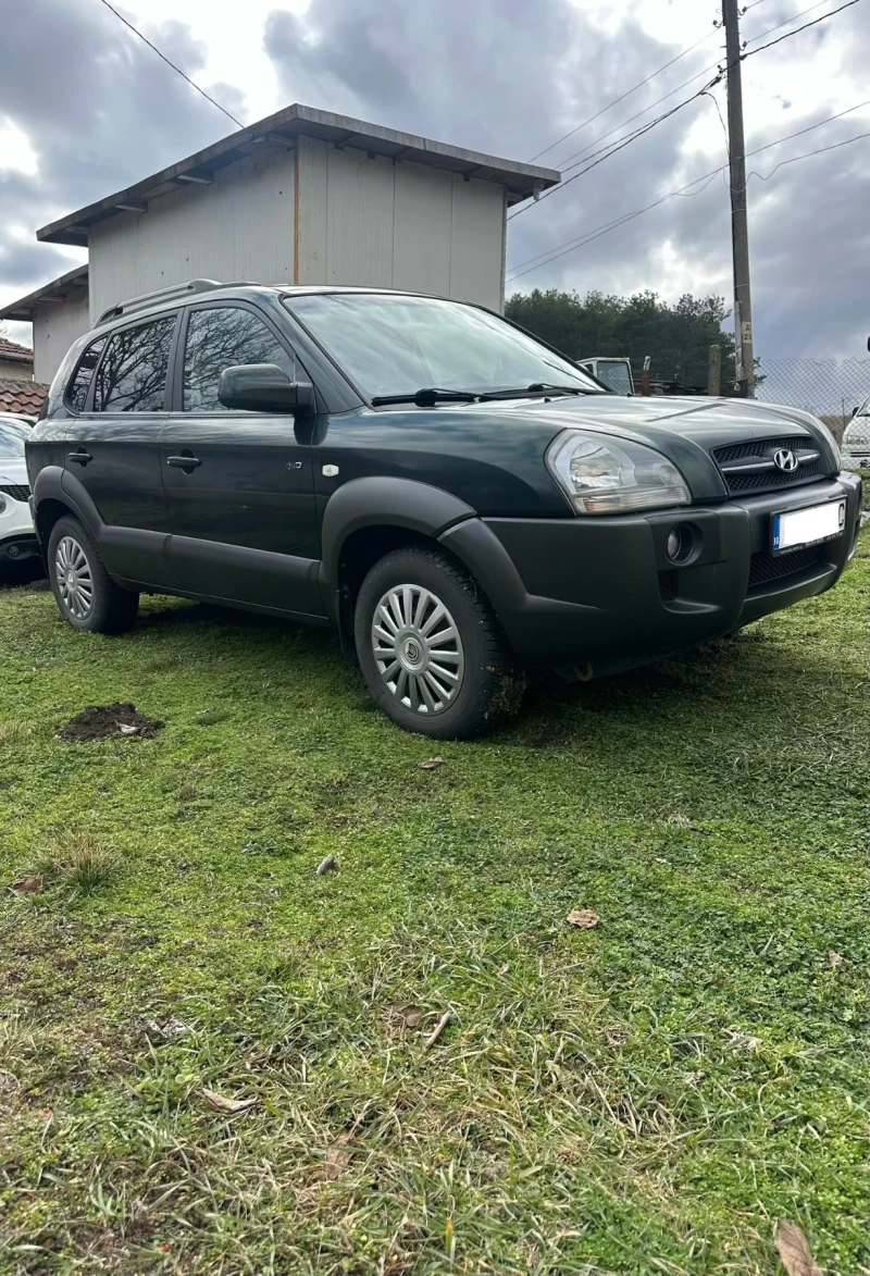 Hyundai Tucson 2.0 4Х4, снимка 7 - Автомобили и джипове - 53507460