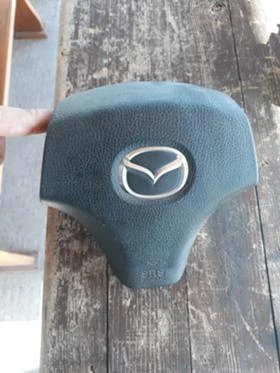      ,   Mazda Mpv