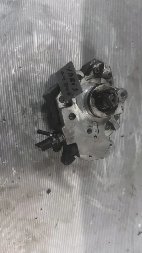         ()  Toyota Yaris 2004 - 0445 010 113 , 22100-0N011