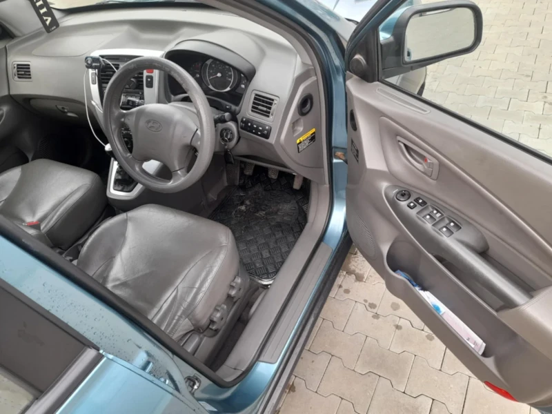 Hyundai Tucson 2.0 140 к.с., снимка 11 - Автомобили и джипове - 49555205