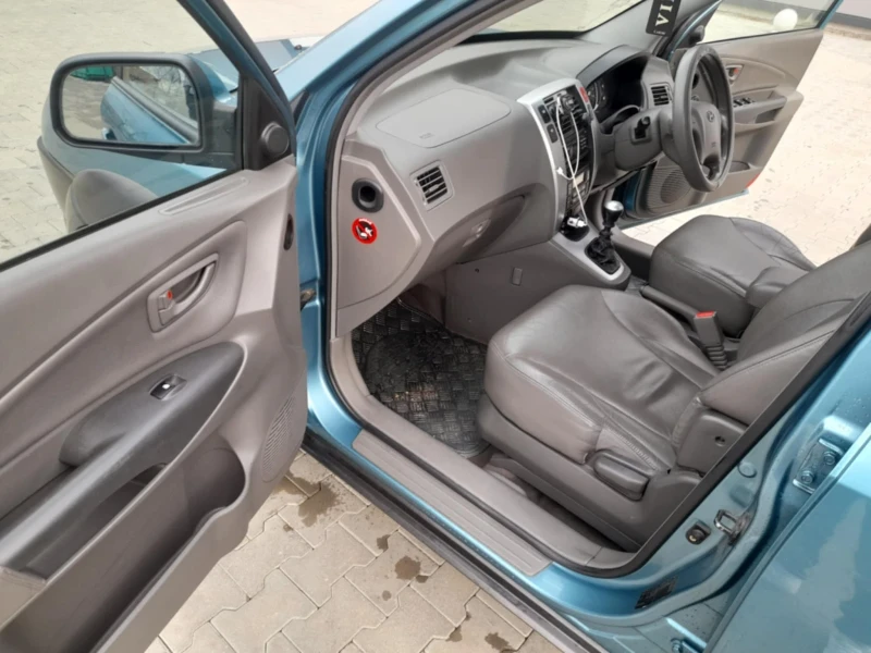 Hyundai Tucson 2.0 140 к.с., снимка 15 - Автомобили и джипове - 49555205