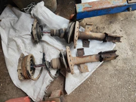 Renault CLIO III (2005-) макферсон преден 25 евро пружина 10 евро 0884333269 ремонт заден мост