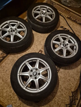 Гуми с джанти Dunlop 205/55R16, снимка 2 - Гуми и джанти - 49290186