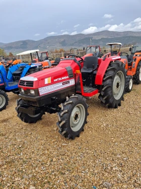 Трактор Kubota 