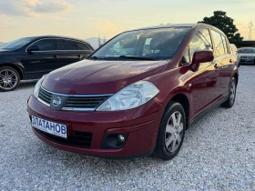 Nissan Tiida 1.6 i 140000km.
