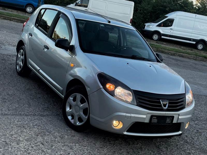 Dacia Sandero 1.4* ГАЗ* КЛИМА, снимка 3 - Автомобили и джипове - 47553623