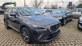 Mazda CX-3 2.0i Excceed Revolution keyless  дистрониk кожа  - 12690 € / 24819.48 лв. - 42344312 3