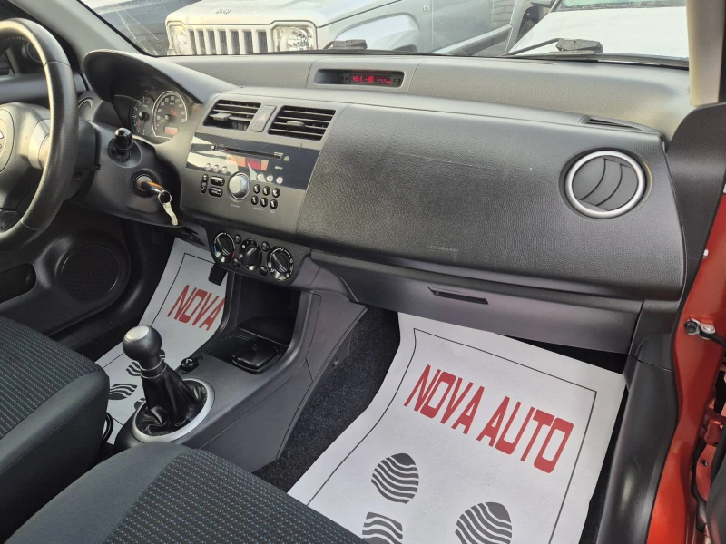 Suzuki Swift 1.3i-2011г, снимка 9 - Автомобили и джипове - 52840121