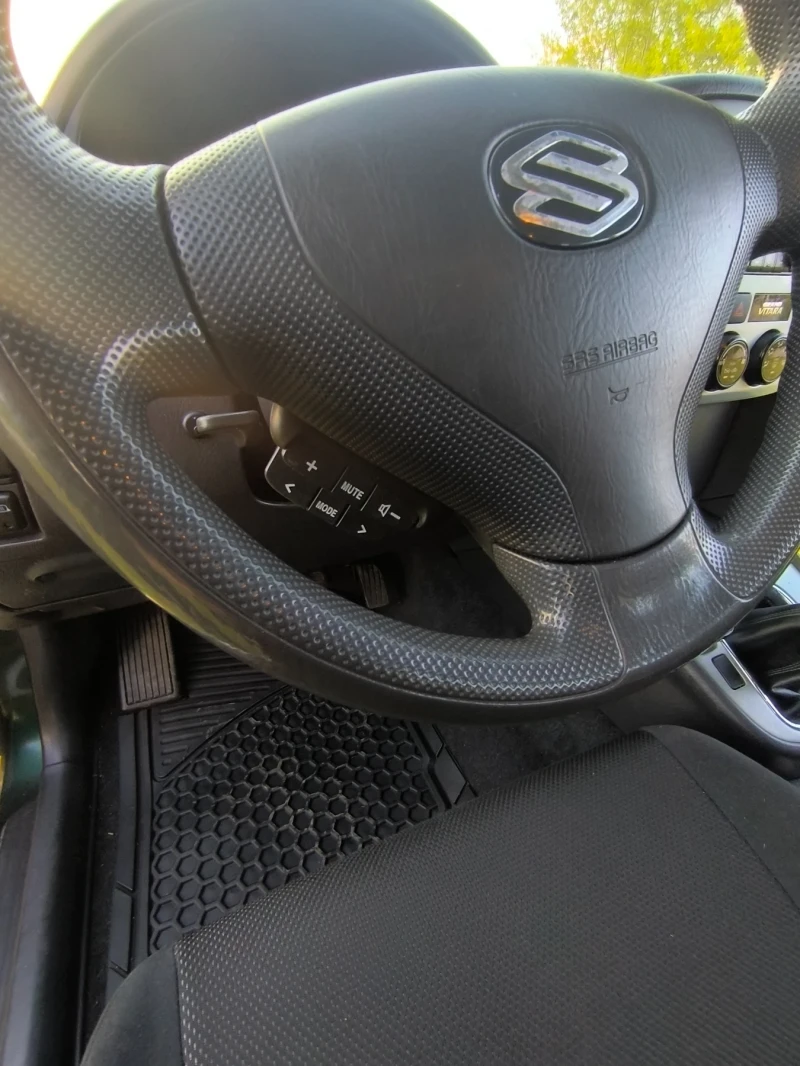 Suzuki Grand vitara 2.0HDI, снимка 6 - Автомобили и джипове - 52439036