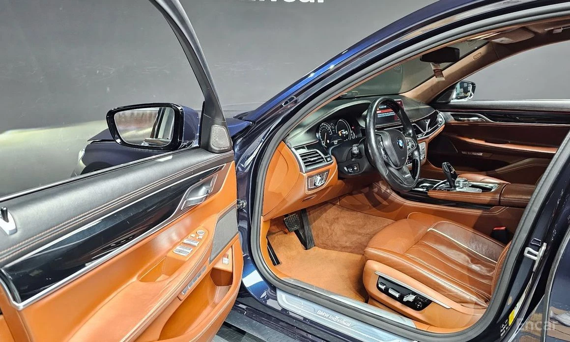 BMW 750, снимка 11 - Автомобили и джипове - 54629566