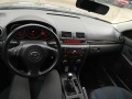 Mazda 3  1.6 Газ/Бензин 106 к.с. - изображение 8