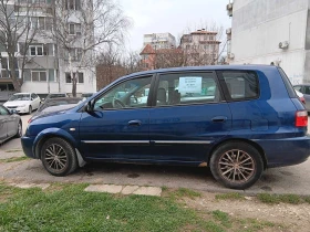 Kia Carens, снимка 9