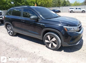 ������ VW Taos