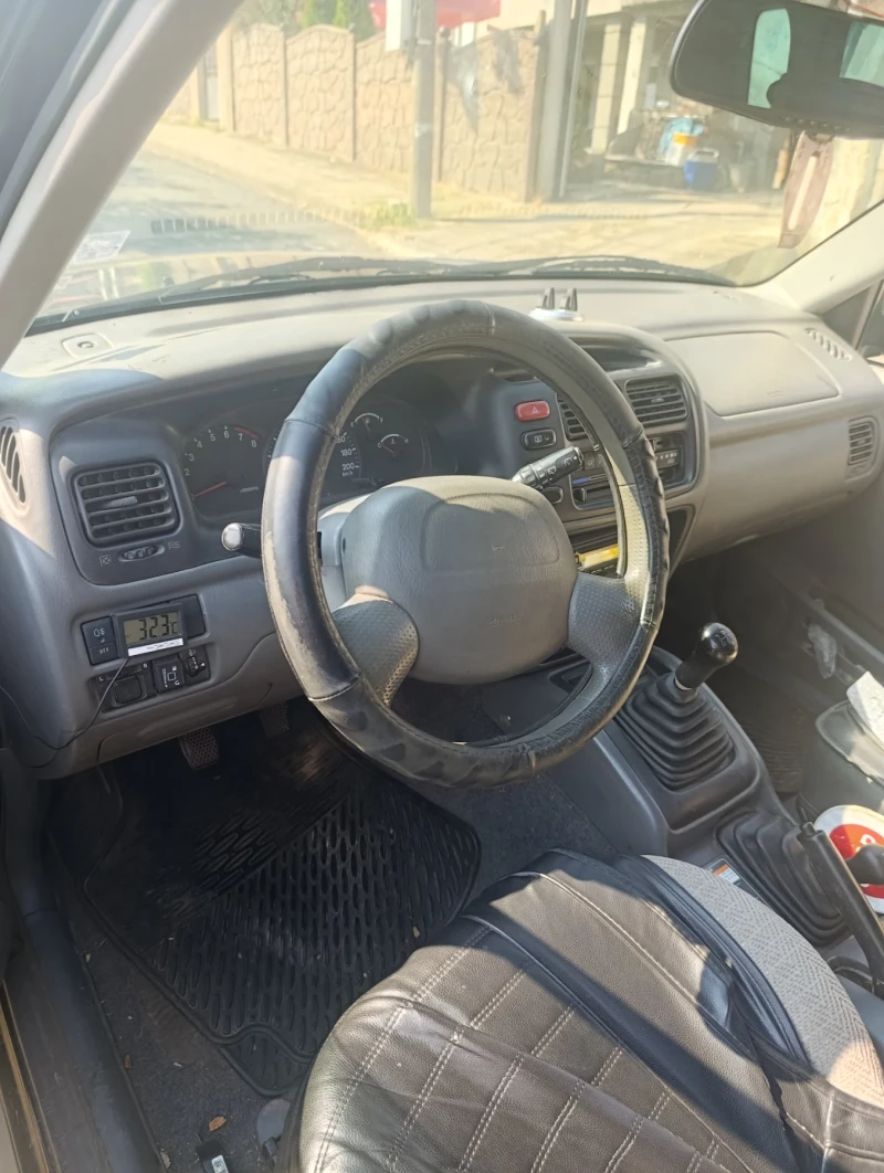 Suzuki Grand vitara, снимка 8 - Автомобили и джипове - 52061797
