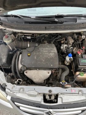 Suzuki Liana 1.6 LPG, снимка 10 - Автомобили и джипове - 53643455