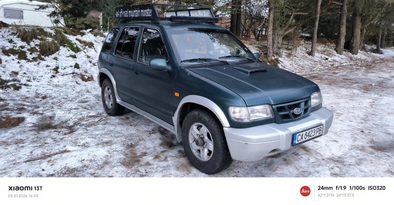 Kia Sportage 2.0 TD , снимка 9 - Автомобили и джипове - 52975846