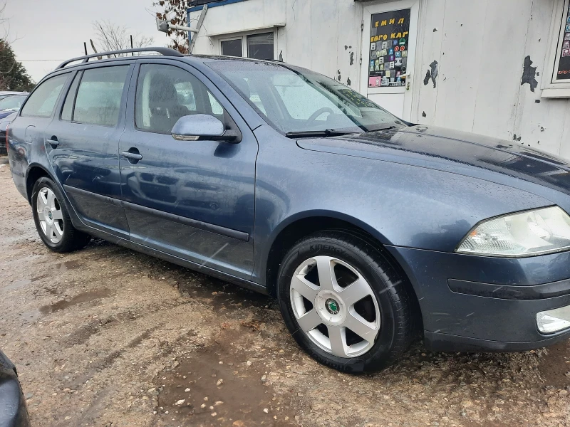 Skoda Octavia 1.6i 102к.с ПЕРФЕКТНА!, снимка 3 - Автомобили и джипове - 49182942