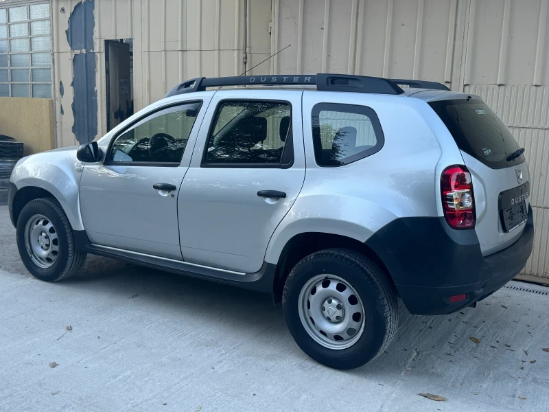 Dacia Duster 1.6i, снимка 7 - Автомобили и джипове - 47613491